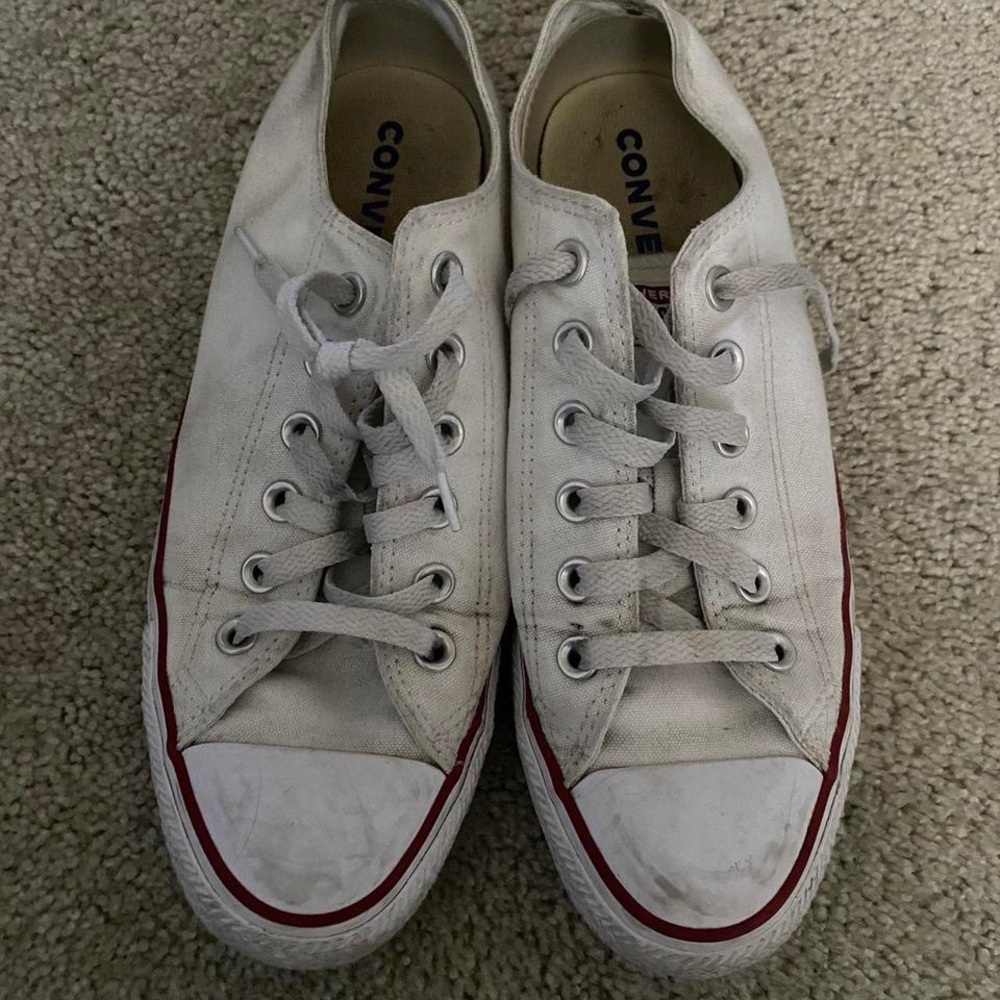 Color - white low top converse.